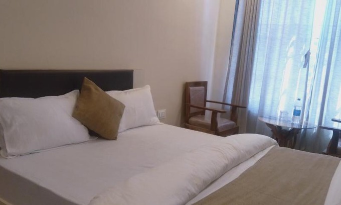 Kopar Khairane Hotel | Hotels In Ghansoli With Air Conditioner, Smoking, Laundry