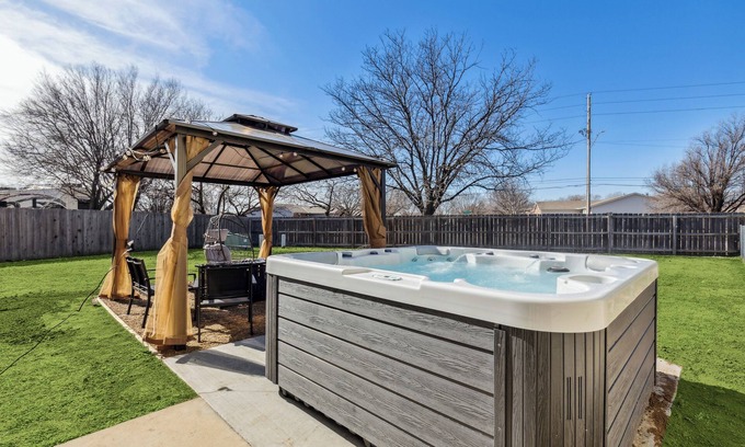 Wichita House | HotTub, Theater, Kings, & Firepit - NearWesley