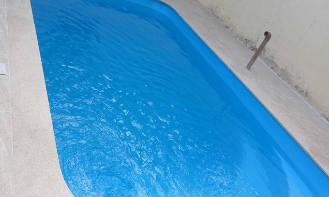 Tupy House | House with 2 bedrooms, swimming pool and barbecue, 8 minutes from the beach on foot.