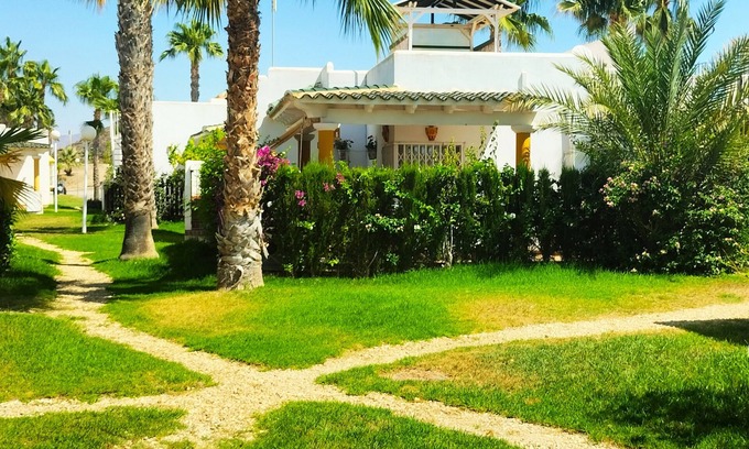 San Juan de los Terreros House | House with terrace of flowers and solarium, near beaches, A/C, wifi, Sat TV, BBQ