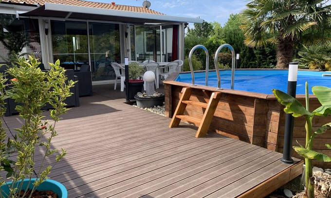 Saint Laurent de la Pree House | House with large veranda terrace and above-ground pool