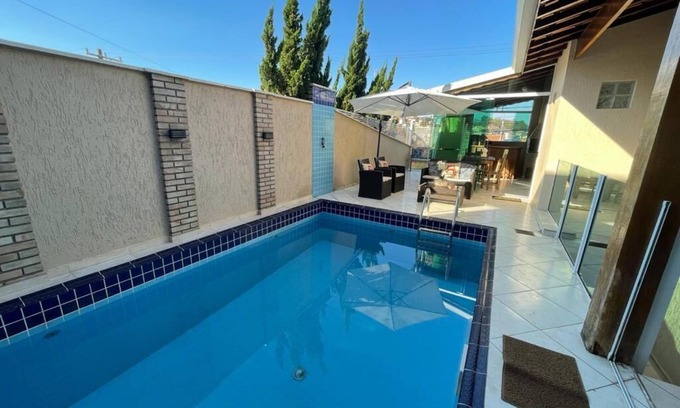 Cotia House | House in Cotia Next to Animalia and Thermas