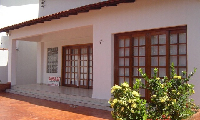 Loteamento Joao Batista Juliao House | House in Guarujá Enseada - Jardim Virginia I
