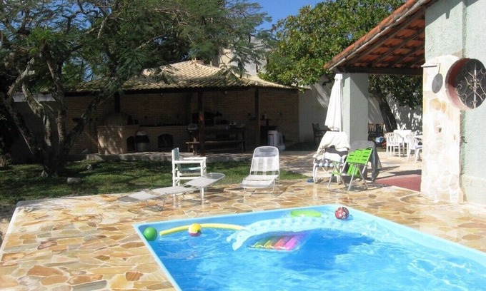 Praia da Vila House | House surrounded porch, 4 bedrooms, pool, barbecue and volleyball court