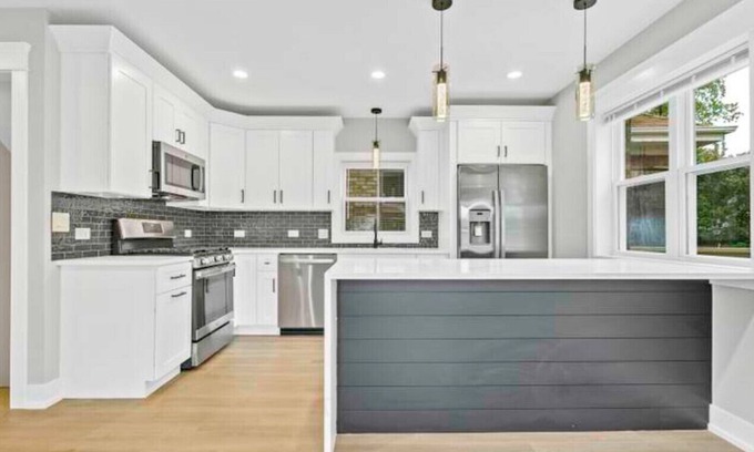 Chester Highlands House | House with garage, outdoor dining and basement bar