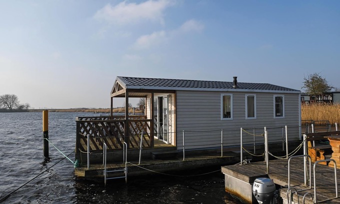 Suderstapel House | Houseboat 1 on the Eider - your floating mini-holiday home with river views