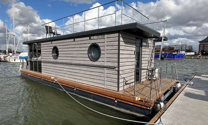 Lundby Boat Rental | Houseboat GREBBESTAD with roof terrace in the heart of Gothenburg