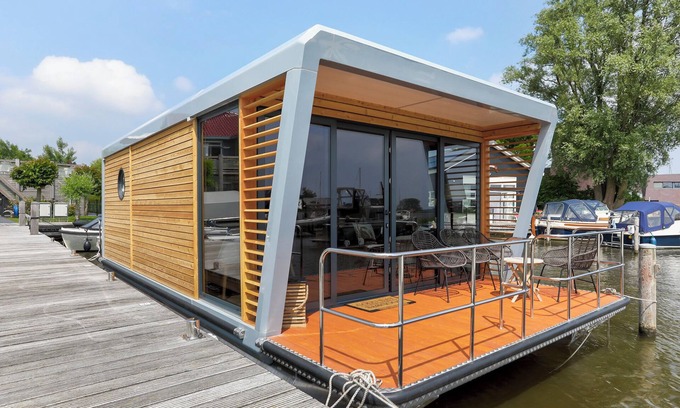 Grou Boat Rental | Houseboat Smuk, enjoy from your own outdoor terrace and water views.
