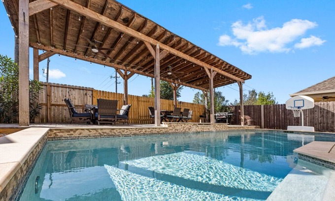Cypress House | Houston Staycation Heated Pool Theater Room Family