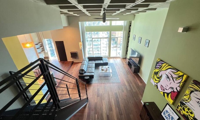 Church and Wellesley Apartment | Huge 2 Storey Loft W designer furniture and art