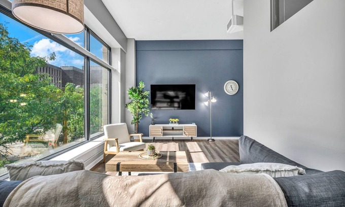 Gateway District Apartment | HUGE Loft in Heart of Downtown Pool & Spa Gym