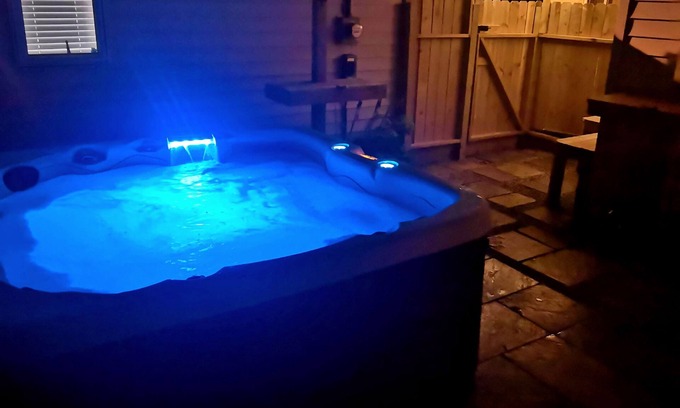 Huntington Apartment | Huntington's Hidden Gem! Private Hot Tub, King Size bed! Perfect Couple Getaway!