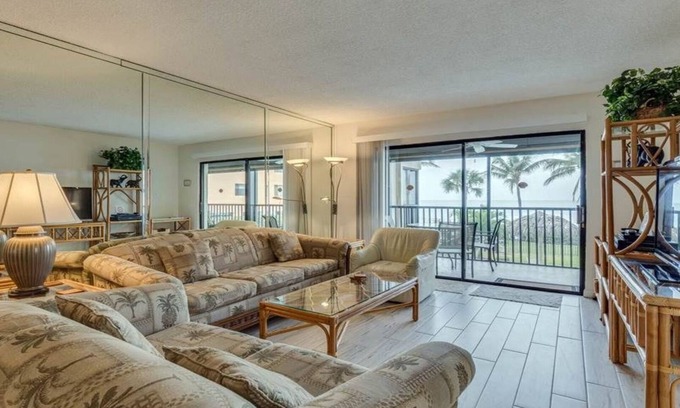 Mid Island Condo | Ideal Beachfront location, Spectacular Sunsets, Bright Lovely Corner Condo