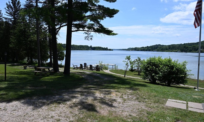 Lake Leelanau Cottage | IDEAL LOCATION @ THE NARROWS ON SOUTH LAKE LEELANAU W/DOCK.nPerfect Sunsets