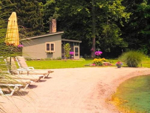 Wooster House | Idyllic Family Cabin with a Private Beach for a Getaway from Akron, Ohio