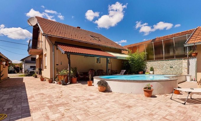 Pakrac House | Idyllic, family-friendly vacation home with private outdoor pool and lush garden.