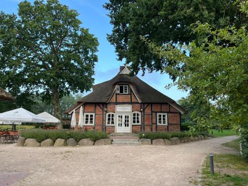 Ploen Apartment | Idyllischer Erholungsurlaub im Historischen Bauernhaus auf der Prinzeninsel Plön