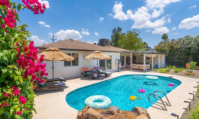 Village Grove House | Imagine landing in Scottsdale and stepping straight into your own private island oasis. At Mai Tai Manor, the days are made for poolside lounging, tiki bar cocktails, and group dinners that stretch into laughter-filled nights under string lights.