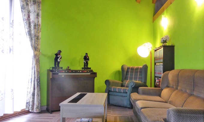 Laviana House | In the heart of Asturias welcomes you this colorful vacation home.