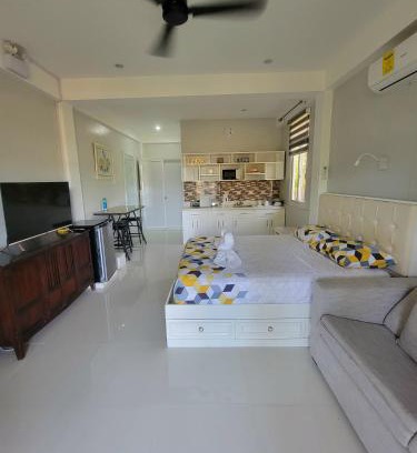 Panglao House | INATO SUITES Rm 1 1 queen bed and a pullout sofa bed