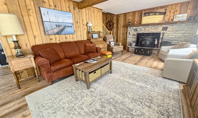 Indian River Cottage | Incredible lakefront house with cottages, dock, fire pit, decks, & amazing views