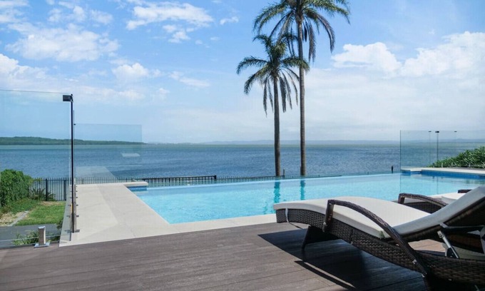 Central Coast Villa | Infinity on Moss Panoramic Lakefront 6 BDRM Villa