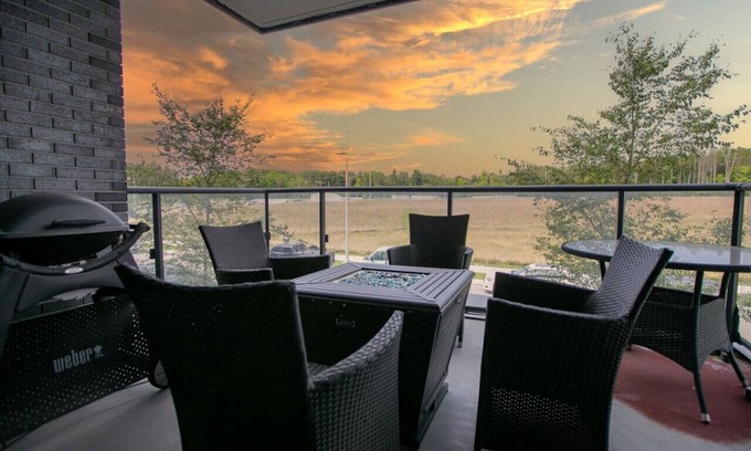 Innisfil Apartment | Innisfil 2BR Condo | Balcony, BBQ & Fire Table