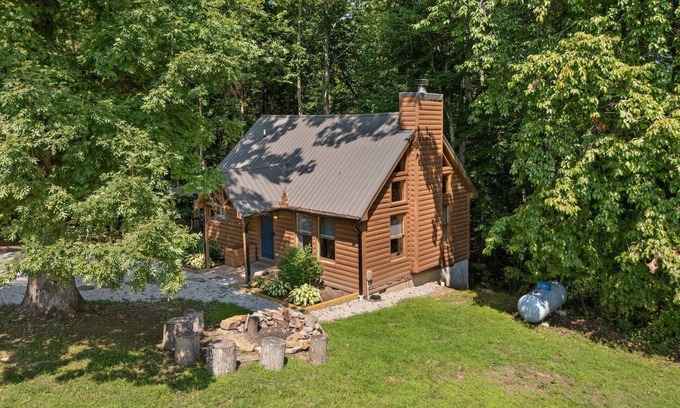 Rogers Cabin | Inviting, charming 2BR, log cabin located in the Scenic Heights neighborhood.