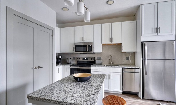 Waller Creek District Apartment | Inviting Downtown 1BR w/Deck & Gym, nr Congress Ave, by Blueground