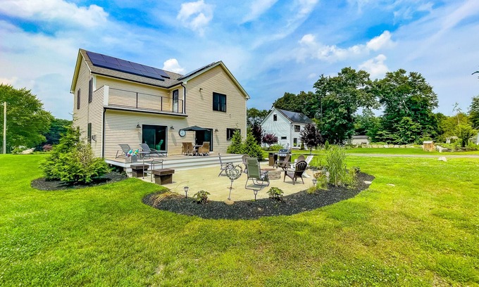 Salisbury House | Inviting house in Salisbury with EV charger, balcony, firepit, and gas grill