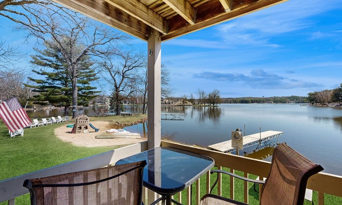 Lake Delton House | Inviting lakefront condo - amazing views, beach access, fireplace, dock, AC, W/D