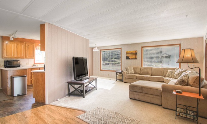 Harrison House | Inviting lakefront home with dock, fireplace, mountain view, & W/D