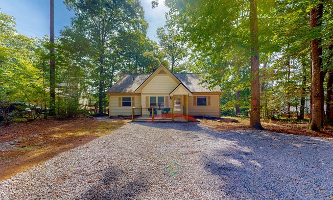 Hardwick House | Inviting waterfront home with fireplace, dock, patio, central AC, & W/D