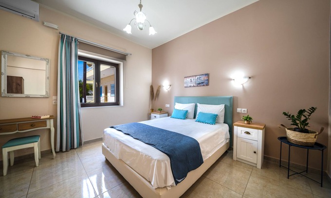 Nea Chora Apartment | Iro Boutique Home 1: perfect location steps from the sandy beach in Chania town