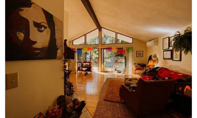 Clinton House | Island Jungalow Surrounded by Evergreens