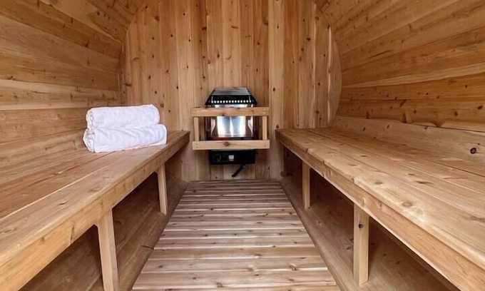 Anaconda Cottage | It's Sauna Season! Cozy up in the barrel sauna!