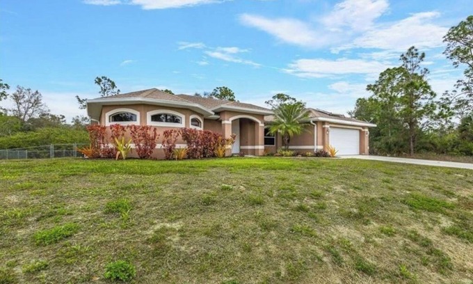 Lehigh Acres House | Its a beautiful house for your vacation with heated pool and screen enclosure.