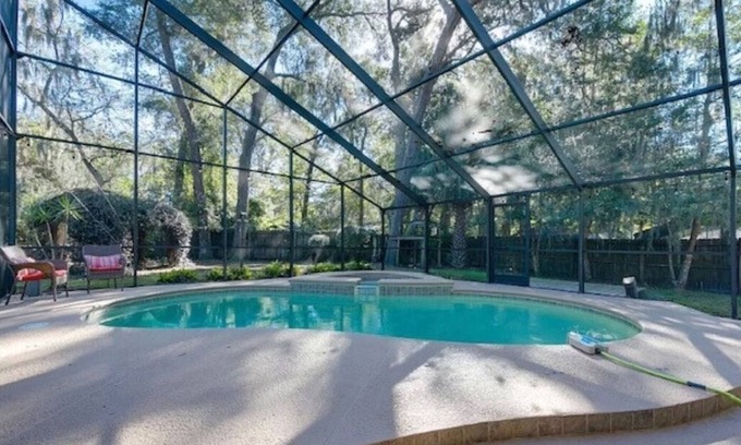 East Arlington House | Jacksonville Beach House Heated Pool 8 min to Hannah Park Beach Pet Friendly