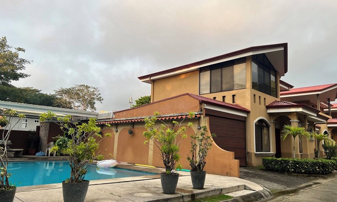 Cerro Plano House | Jaco Hideaway: 1 minute walk to direct beach access.nGated community with pool.