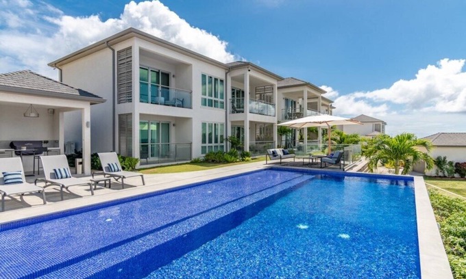 Calvigny Condo | Jade Stylish interior, Ocean Views, great amenities!