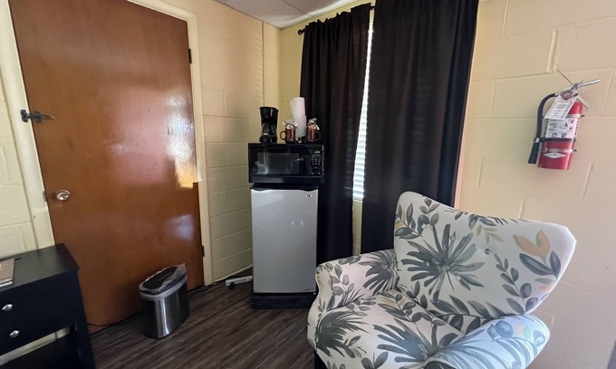 Mount Ida Apartment | JI4, King Guest Room at the Joplin Inn at entrance to the resort by RedAwning