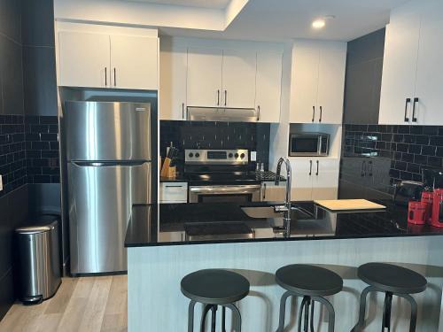 Saint-Roch Apartment | Joli condo en basse-ville - Parking gratuit 309357