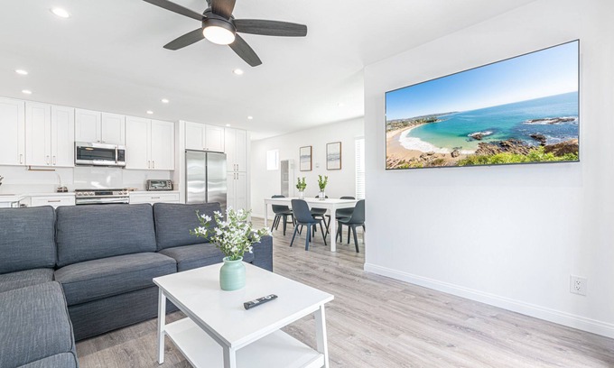 West Newport Condo | Just Listed! Clean, modern, bright, and only steps from the best beach in California!