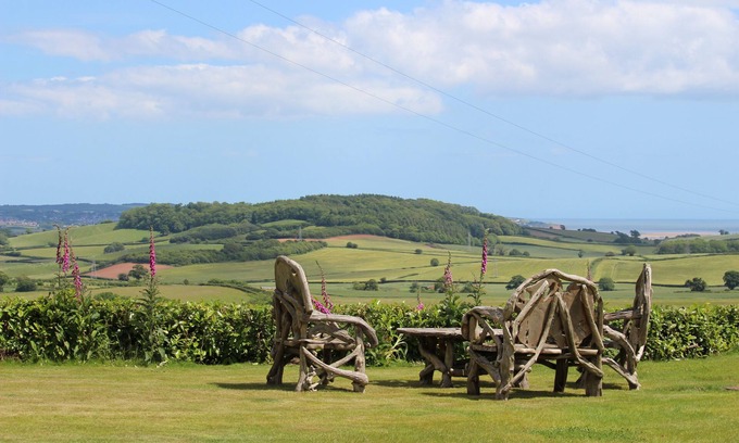 Ebford Cottage | Just outside Exeter, stunning views of Devon hills, estuary and the sea beyond.