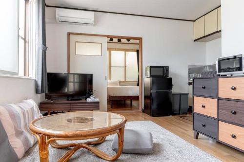 Motomachi Apartment | KAKUREGA by unito