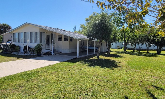 Edgewater House | Kick Back & Relax with two pools, a boat launch, community pier and more!