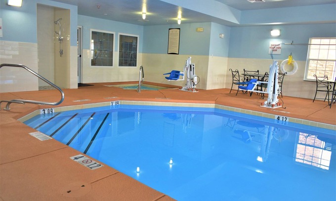 Northeast Heights Condo | King Suite | Free Breakfast Buffet! Pool + Hot Tub Access