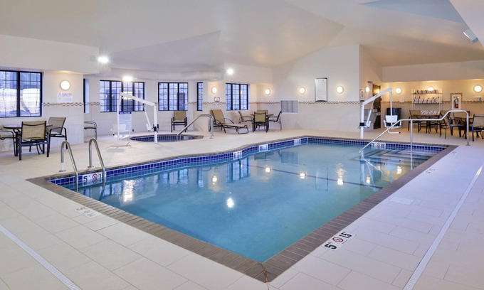 Rochester Condo | King Suite in Rochester | Free Breakfast + Shared Pool & Hot Tub. Great for Business Travelers!