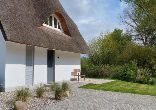 Am Salzhaff House | Kleine Binsenjungfer - Ferienhaus mit Sauna und Kamin für 6 Personen
