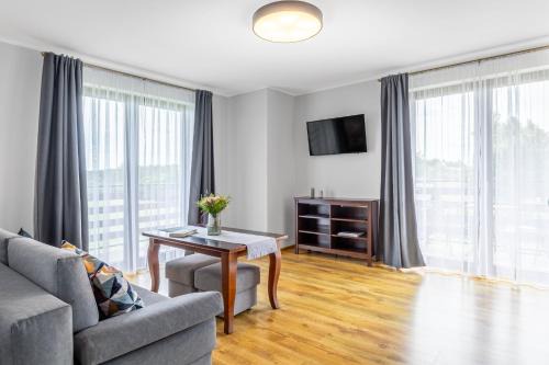 Ostrowo House | Komfort i spokój blisko natury - Apartamenty i pokoje ARKO
